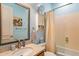 Clean bathroom with single sink and tub shower combo at 22719 N 93Rd St, Scottsdale, AZ 85255