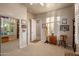 Bright bedroom with mirrored closet and hardwood floors at 22719 N 93Rd St, Scottsdale, AZ 85255