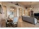Open floor plan with dining table and living room furniture at 22719 N 93Rd St, Scottsdale, AZ 85255
