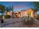 Stunning single story home with desert landscaping and a three car garage at 22719 N 93Rd St, Scottsdale, AZ 85255