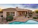 Beautiful home exterior with a stunning pool and patio at 22719 N 93Rd St, Scottsdale, AZ 85255