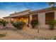 Landscaped yard with desert plants and rock features at 22719 N 93Rd St, Scottsdale, AZ 85255