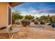 Covered patio with table and chairs, overlooking yard at 22719 N 93Rd St, Scottsdale, AZ 85255