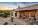 Spacious patio with fireplace and seating area at 22719 N 93Rd St, Scottsdale, AZ 85255