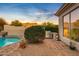 Inviting pool area with patio and built-in grill at 22719 N 93Rd St, Scottsdale, AZ 85255