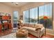 Relaxing sitting area with a view of the pool and backyard, perfect for lounging at 22719 N 93Rd St, Scottsdale, AZ 85255