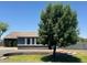House with a gray exterior, white shutters, and landscaping at 22834 E Mccowan Ct, Queen Creek, AZ 85142