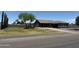 Single-story home with a large front yard and a long driveway at 22834 E Mccowan Ct, Queen Creek, AZ 85142
