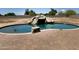 Kidney-shaped pool with a rock waterfall feature at 22834 E Mccowan Ct, Queen Creek, AZ 85142