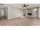 Spacious living room featuring a modern fireplace and tile floors at 4123 E Greenway Ln, Phoenix, AZ 85032