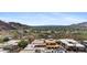Aerial view of new construction home in a luxury community with lush trees at 5761 N Echo Canyon Cir, Phoenix, AZ 85018