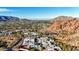 Community nestled in mountains with city views and modern homes at 5761 N Echo Canyon Cir, Phoenix, AZ 85018