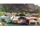 Under construction home in a community with mountain backdrop at 5761 N Echo Canyon Cir, Phoenix, AZ 85018