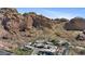 Community aerial view of luxury homes next to a mountain with lush landscaping at 5761 N Echo Canyon Cir, Phoenix, AZ 85018