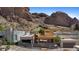 View of new construction home framed and fenced with mountain backdrop at 5761 N Echo Canyon Cir, Phoenix, AZ 85018