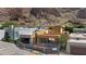 View of new construction home framed and fenced in a desert setting at 5761 N Echo Canyon Cir, Phoenix, AZ 85018