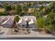 Single-story home with two-car garage and landscaped yard at 6413 W Irma Ln, Glendale, AZ 85308