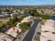 Community view showcasing home near lake at 6413 W Irma Ln, Glendale, AZ 85308