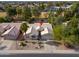 Single-story home with two-car garage and landscaped yard at 6413 W Irma Ln, Glendale, AZ 85308
