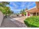 Landscaped backyard with flagstone pathway at 6413 W Irma Ln, Glendale, AZ 85308