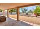 Covered patio overlooking a spacious backyard at 6413 W Irma Ln, Glendale, AZ 85308