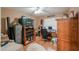 Bedroom with wood flooring, built-in shelving and desk at 6413 W Irma Ln, Glendale, AZ 85308