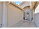 Front entry with security door and terracotta tile flooring at 6413 W Irma Ln, Glendale, AZ 85308