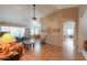 Living room with hardwood floors and view of kitchen at 6413 W Irma Ln, Glendale, AZ 85308