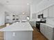 Modern kitchen with island and stainless steel appliances at 6546 E Casa De Risco Ln, Gold Canyon, AZ 85118