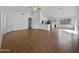 Open living room with hardwood floors and high ceilings at 6546 E Casa De Risco Ln, Gold Canyon, AZ 85118
