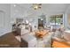 Bright living room with hardwood floors and comfy seating at 6546 E Casa De Risco Ln, Gold Canyon, AZ 85118