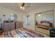 Bedroom with double bed, dresser, and mirrored closet at 8323 W Devonshire Ave, Phoenix, AZ 85037