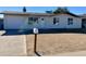 Newly renovated single story home with a clean, modern design and spacious yard at 8323 W Devonshire Ave, Phoenix, AZ 85037