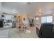 Modern kitchen with white cabinets, granite countertops, and stainless steel appliances at 8323 W Devonshire Ave, Phoenix, AZ 85037
