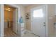 Bright laundry room with washer, dryer, and water dispenser at 8323 W Devonshire Ave, Phoenix, AZ 85037