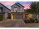 Modern two-story house with attached garage and landscaping at 10050 E Tiburon Ave, Mesa, AZ 85212