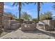 Cozy fire pit area with built-in seating at 10050 E Tiburon Ave, Mesa, AZ 85212