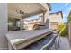 Outdoor kitchen with built-in grill and seating area at 10050 E Tiburon Ave, Mesa, AZ 85212