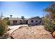 Large backyard with gravel landscaping and patio at 11034 W Alabama Ave, Sun City, AZ 85351