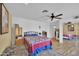 Main bedroom with ample space and ceiling fan at 11034 W Alabama Ave, Sun City, AZ 85351