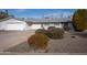 Single story home with a two-car garage and well-maintained landscaping at 11034 W Alabama Ave, Sun City, AZ 85351