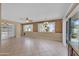 Spacious living room with tile flooring and lots of natural light at 11034 W Alabama Ave, Sun City, AZ 85351