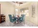 Charming breakfast nook with four chairs and a round table, perfect for enjoying meals at 11462 W Clover Way, Avondale, AZ 85392