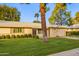 House exterior showcasing a well-maintained lawn and driveway at 15446 N Lakeforest Dr, Sun City, AZ 85351