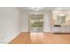 Kitchen with light cabinets and a sliding glass door to the backyard at 15446 N Lakeforest Dr, Sun City, AZ 85351