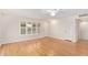 Spacious living area showcasing laminate floors and a large window at 15446 N Lakeforest Dr, Sun City, AZ 85351