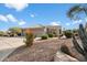 Single-story home with desert landscaping and a two-car garage at 16655 E Saguaro Blvd # 116, Fountain Hills, AZ 85268