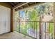 Private balcony overlooking a lush green courtyard at 18811 N 19Th Ave # 3018, Phoenix, AZ 85027