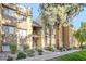 Attractive exterior of a two-story building with landscaping and walkway at 18811 N 19Th Ave # 3018, Phoenix, AZ 85027