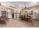 Elegant dining room with a large wood table and seating for eight at 20811 E Excelsior Ave, Queen Creek, AZ 85142